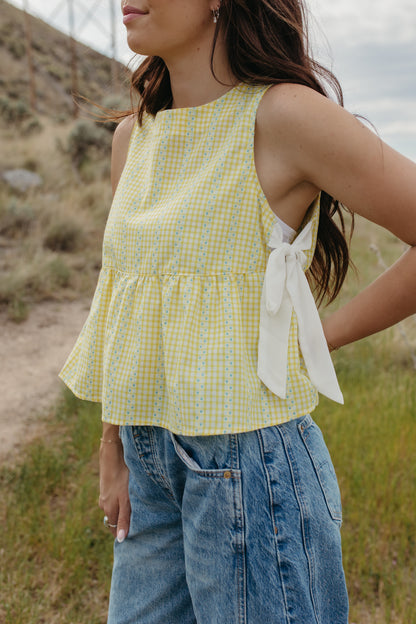 THE EVIE SKY MEADOW PEPLUM TOP IN YELLOW