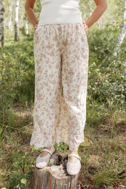 THE NAOMI FLORAL WIDE LEG PANTS IN IVORY
