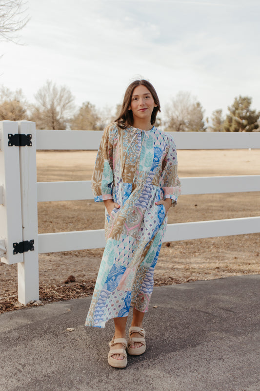 THE SALENA MULTI PRINT MAXI DRESS IN BLUE