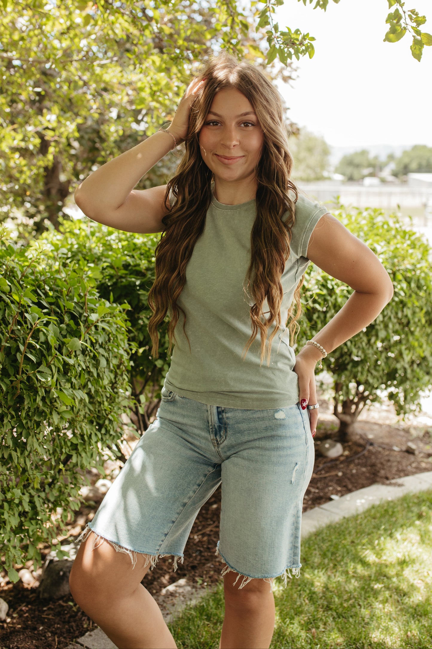 THE CADENCE CAP SLEEVE TOP IN SAGE GREEN