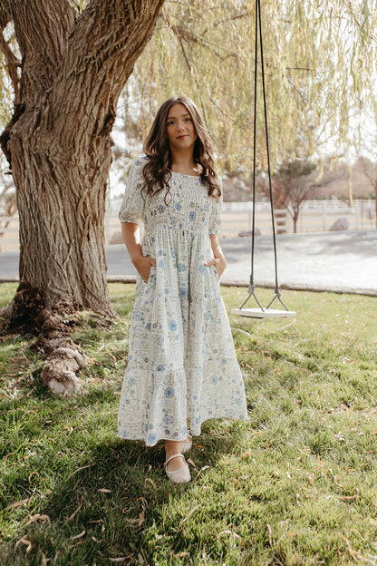 THE LUNA FLORAL SMOCKED DRESS IN BLUE