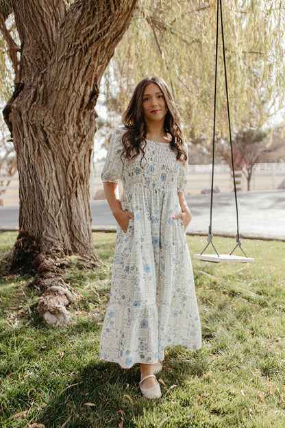 THE LUNA FLORAL SMOCKED DRESS IN BLUE