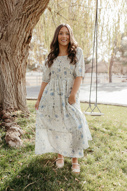 THE LUNA FLORAL SMOCKED DRESS IN BLUE