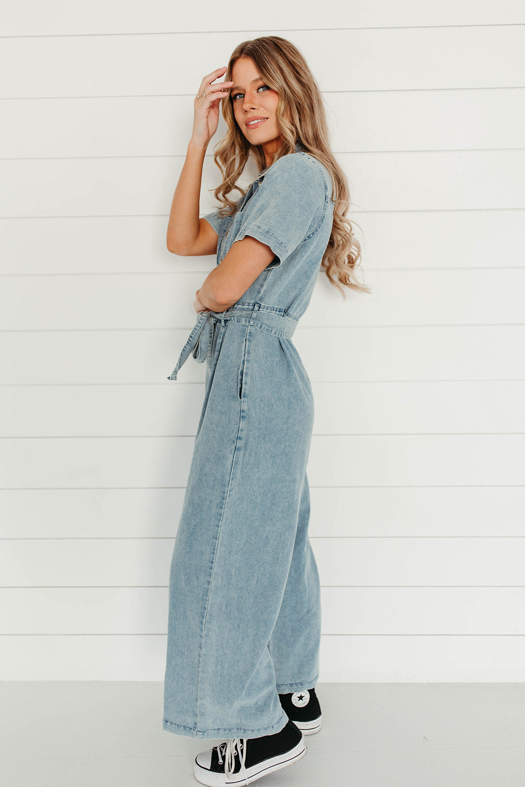 THE DYLANN BELTED JUMPSUIT IN DENIM