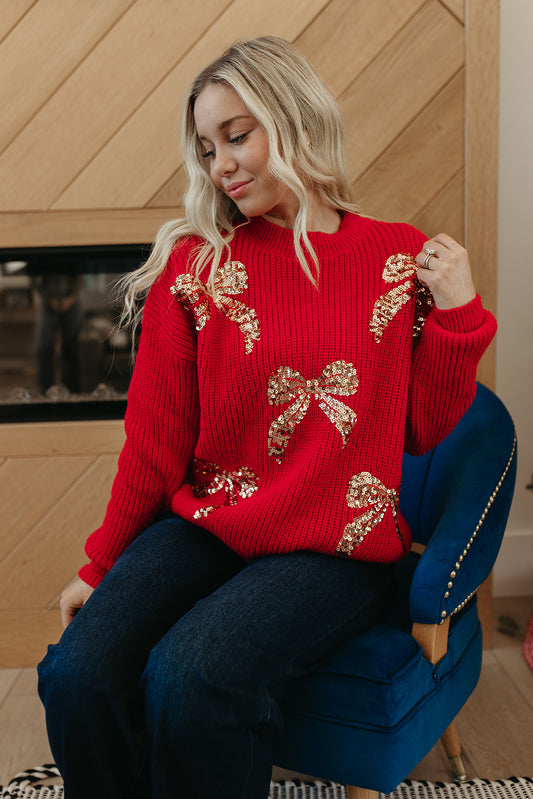 THE ABIGAIL SEQUIN BOWS HOLIDAY SWEATER IN RED
