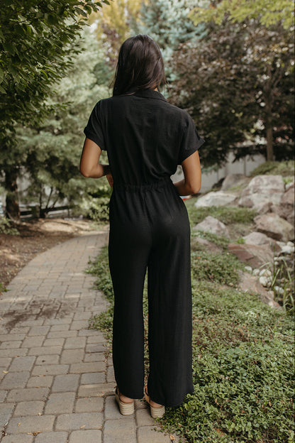 THE JREAM SHORT SLEEVE V-NECK JUMPSUIT IN BLACK