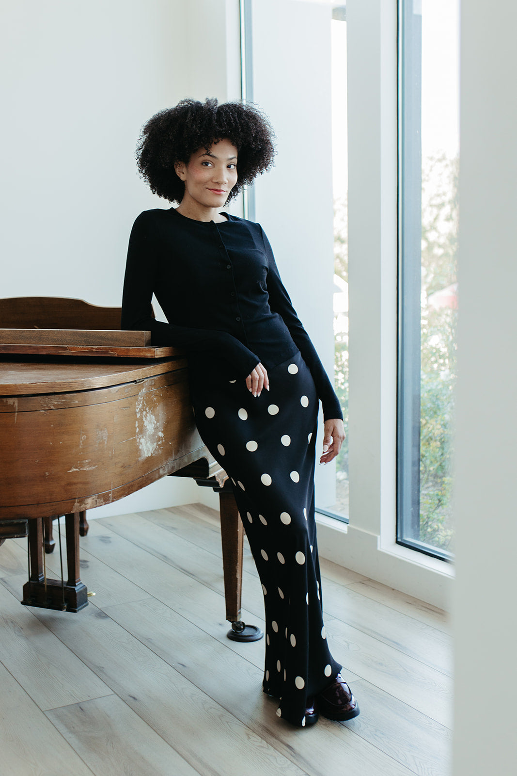 THE OAKLYNN POLKA DOT SATIN SKIRT IN BLACK