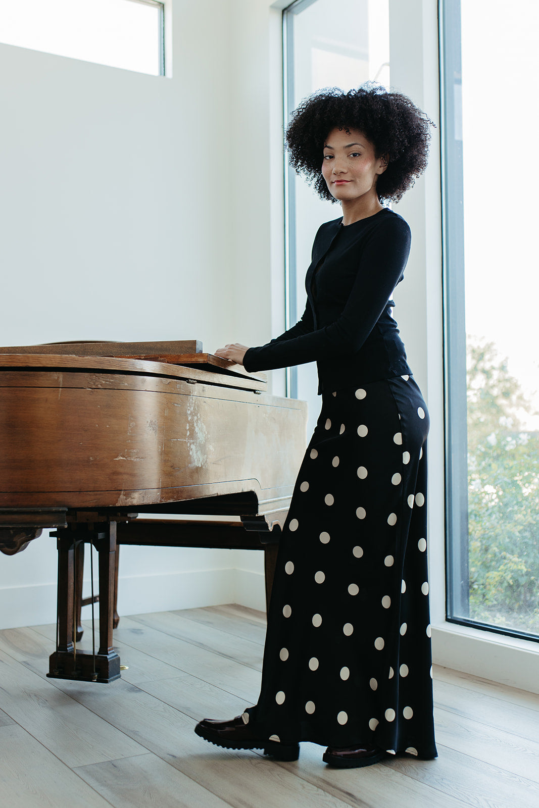 THE OAKLYNN POLKA DOT SATIN SKIRT IN BLACK