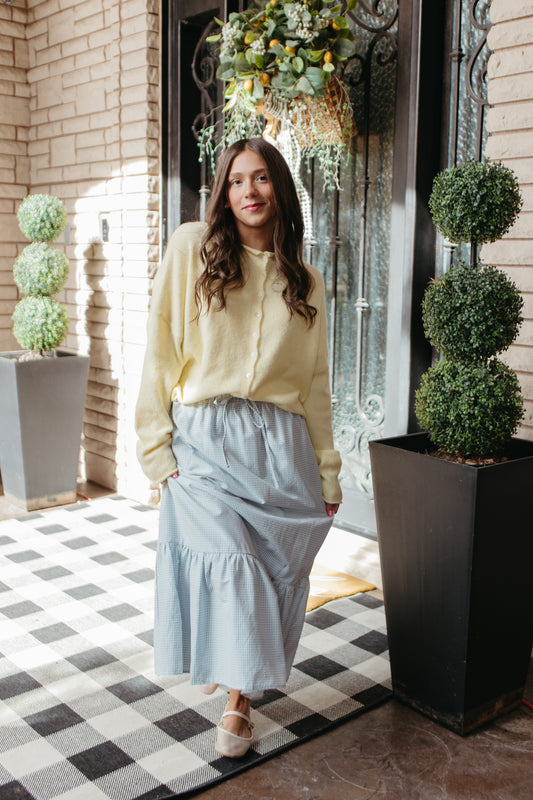 THE BREA GINGHAM MIDI SKIRT IN LIGHT BLUE