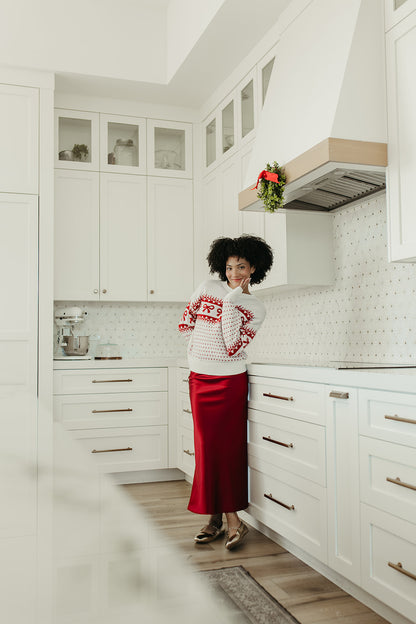 THE HARTLEE BOW SWEATER IN CREAM