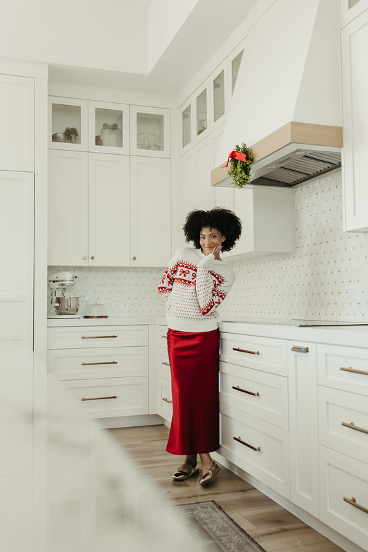 THE HARTLEE BOW SWEATER IN CREAM