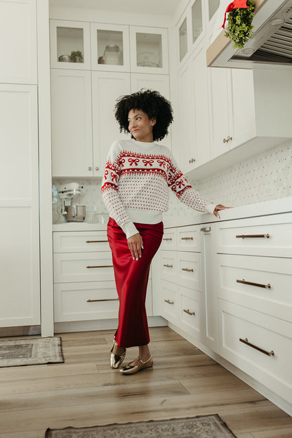 THE HARTLEE BOW SWEATER IN CREAM