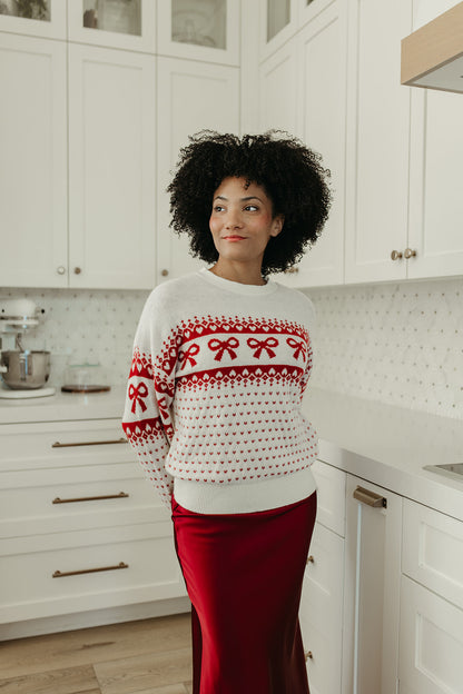THE HARTLEE BOW SWEATER IN CREAM