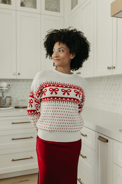 THE HARTLEE BOW SWEATER IN CREAM
