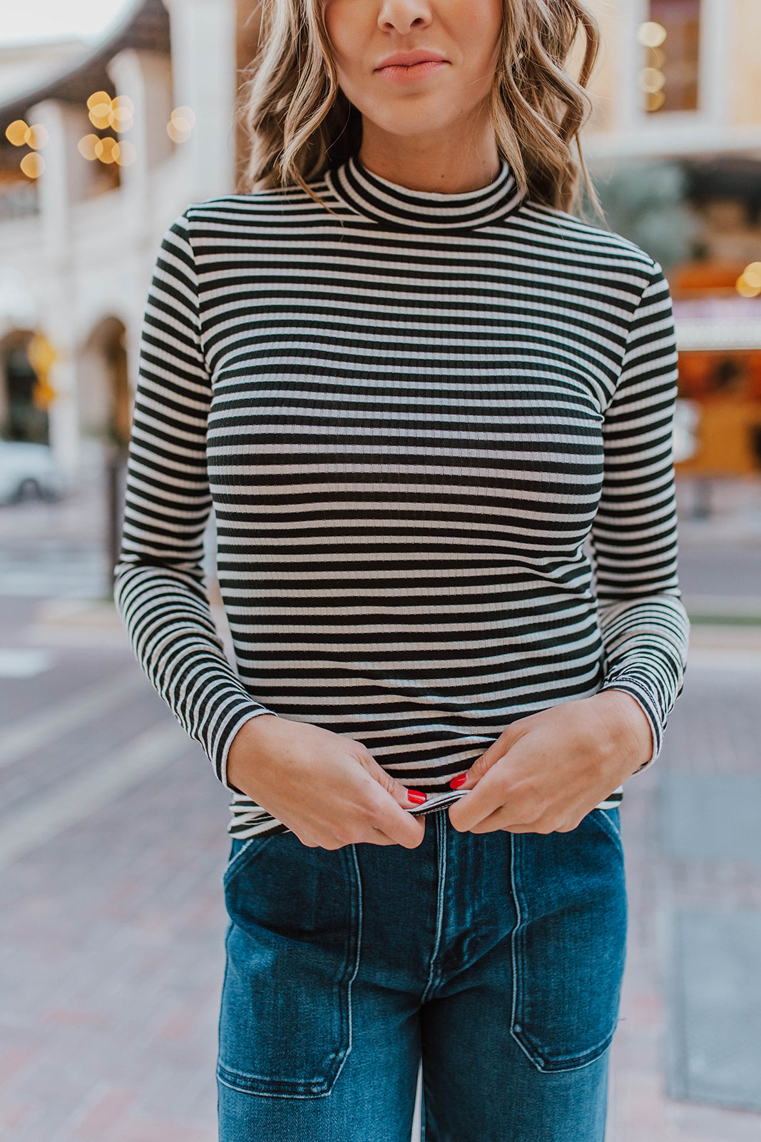 THE SAMMI STRIPED MOCK NECK TOP IN BLACK Pink Desert