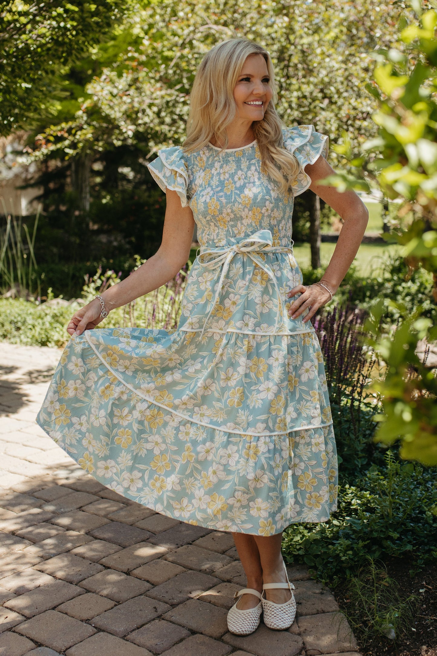 THE CALI FLORAL RUFFLED DRESS IN BLUE
