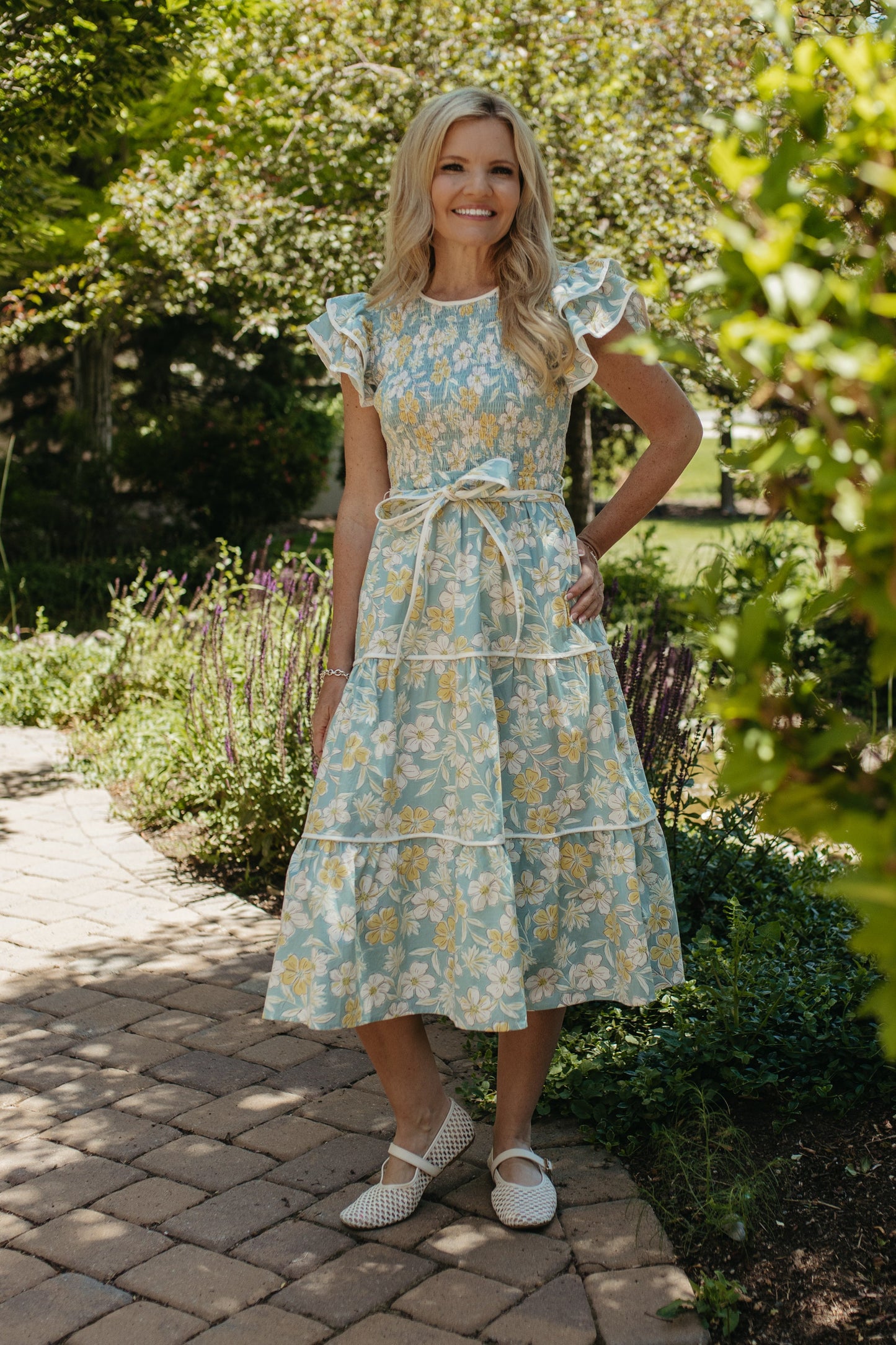 THE CALI FLORAL RUFFLED DRESS IN BLUE