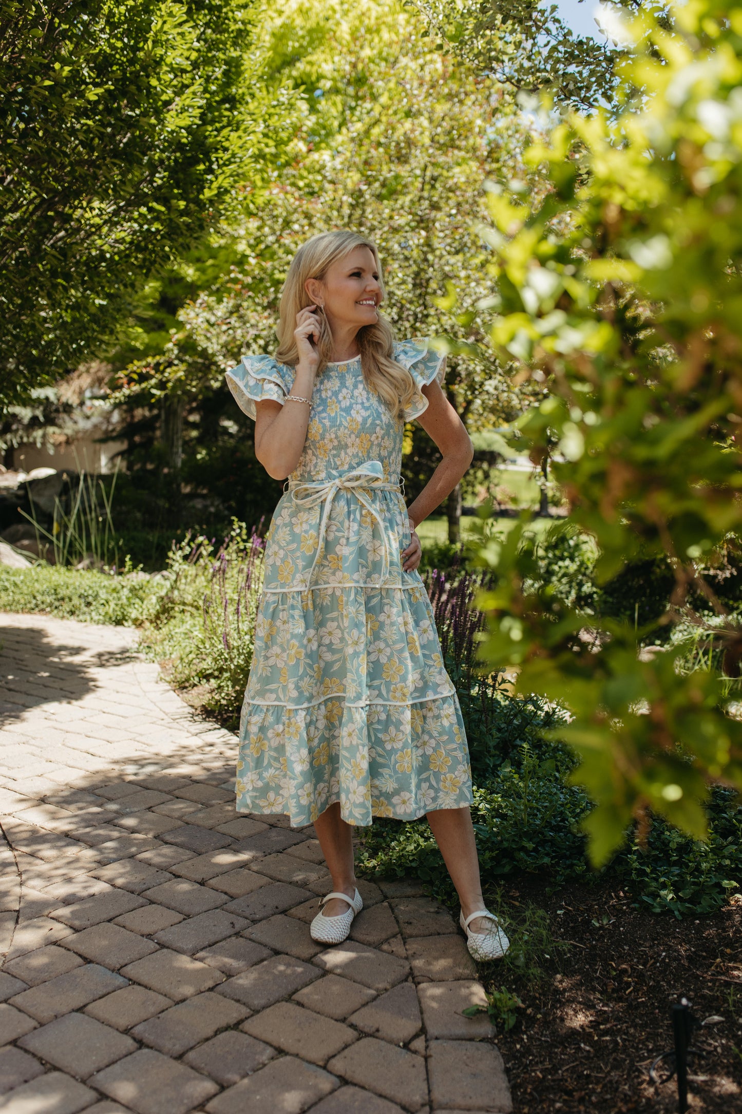 THE CALI FLORAL RUFFLED DRESS IN BLUE
