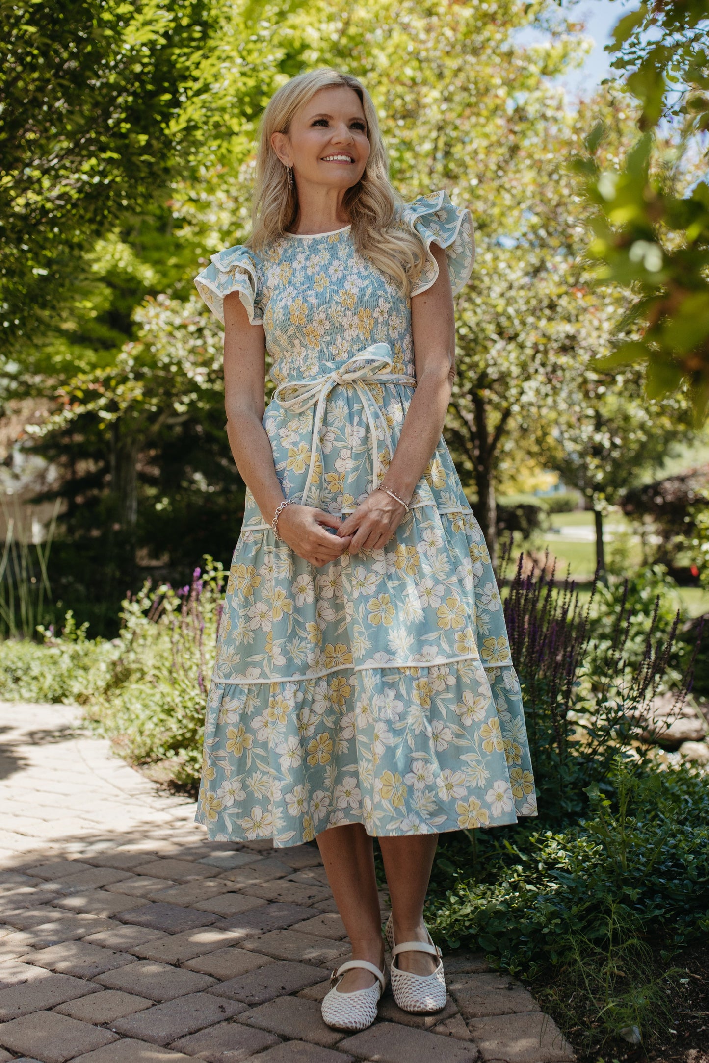 THE CALI FLORAL RUFFLED DRESS IN BLUE