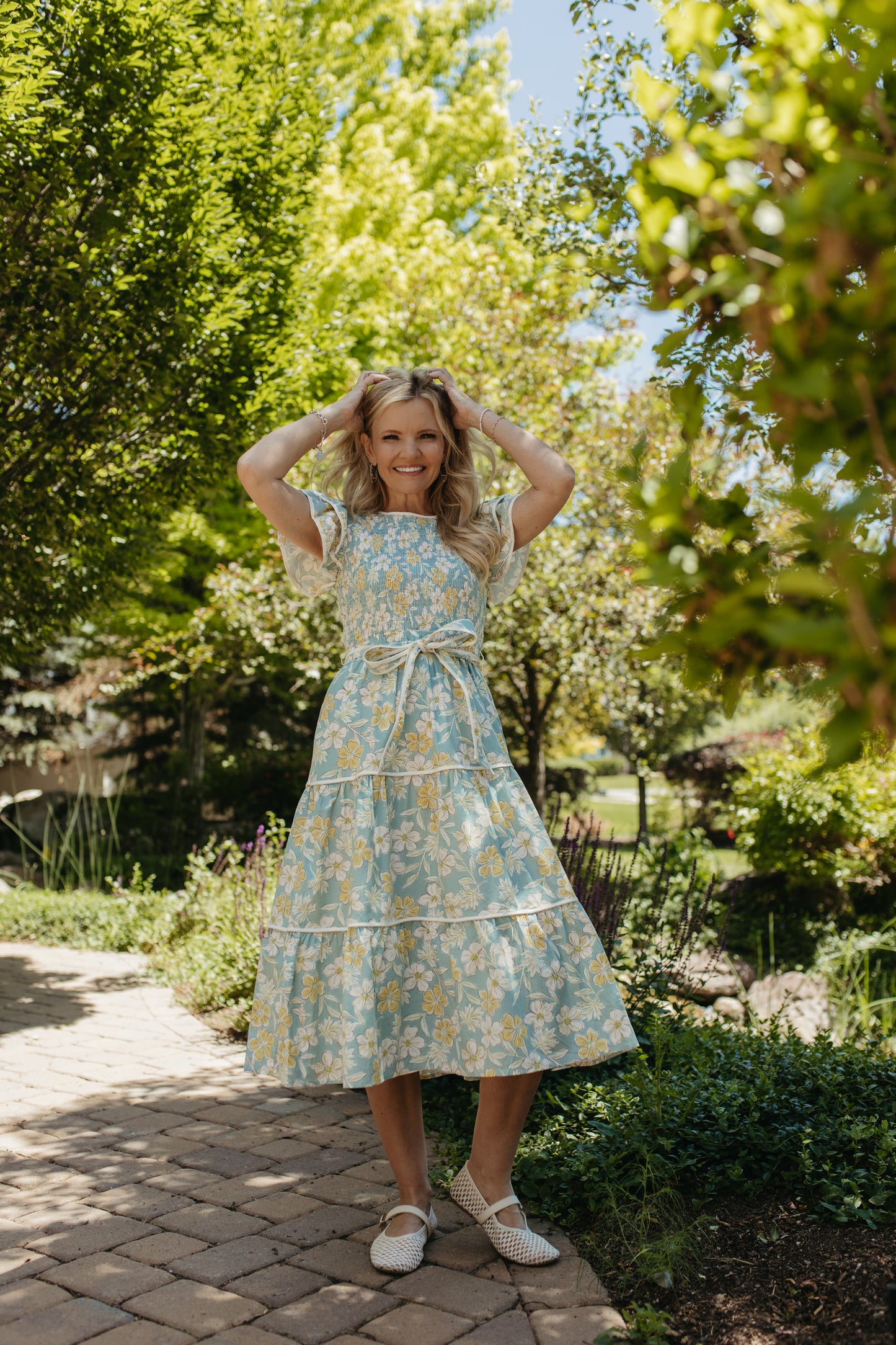THE CALI FLORAL RUFFLED DRESS IN BLUE