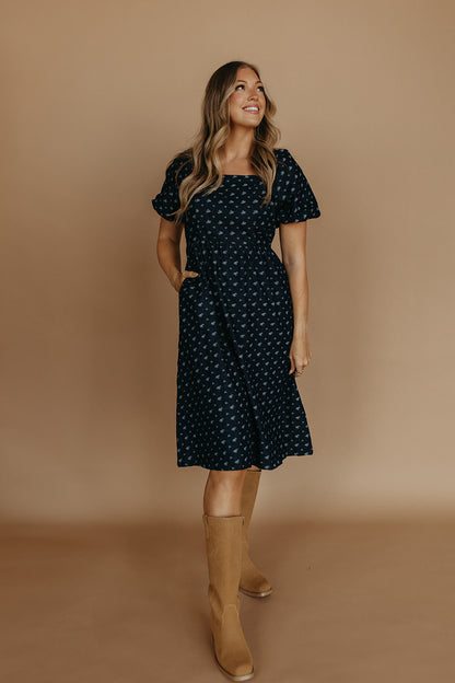 THE MAKENZIE FLORAL JACQUARD DENIM DRESS IN BLUE