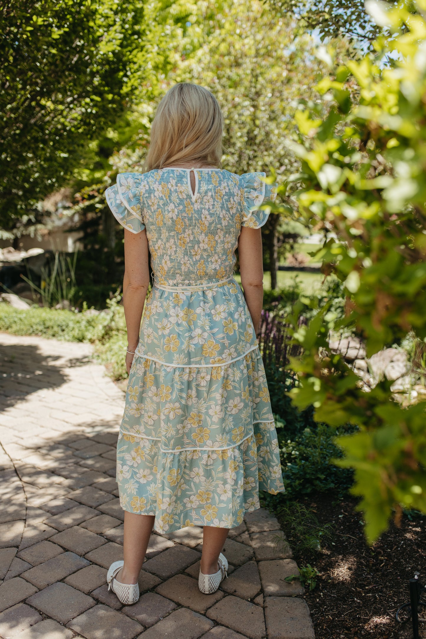 THE CALI FLORAL RUFFLED DRESS IN BLUE