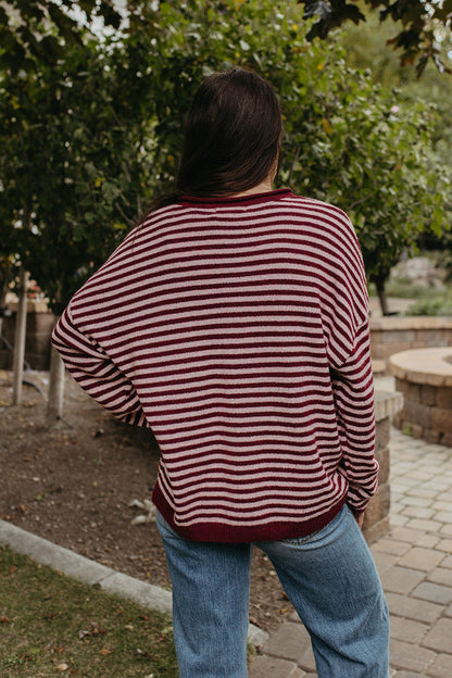 The Anais Stripe Long Sleeve Henley Sweater in Burgundy in Striped, photo 6 of 6