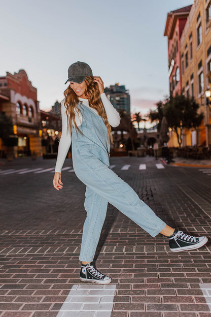 THE DENA DENIM JUMPSUIT IN LIGHT WASH