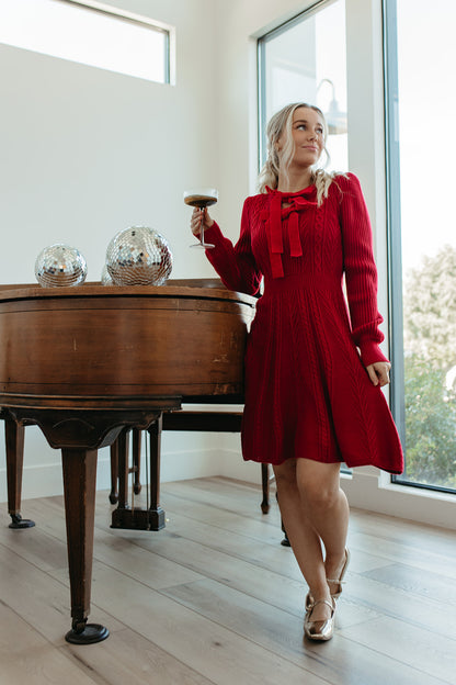 THE NOELLE VELVET BOW SWEATER DRESS IN RED