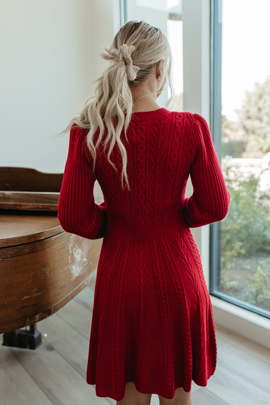 THE NOELLE VELVET BOW SWEATER DRESS IN RED Pink Desert THE NOELLE VELVET BOW SWEATER DRESS IN RED Pink Desert