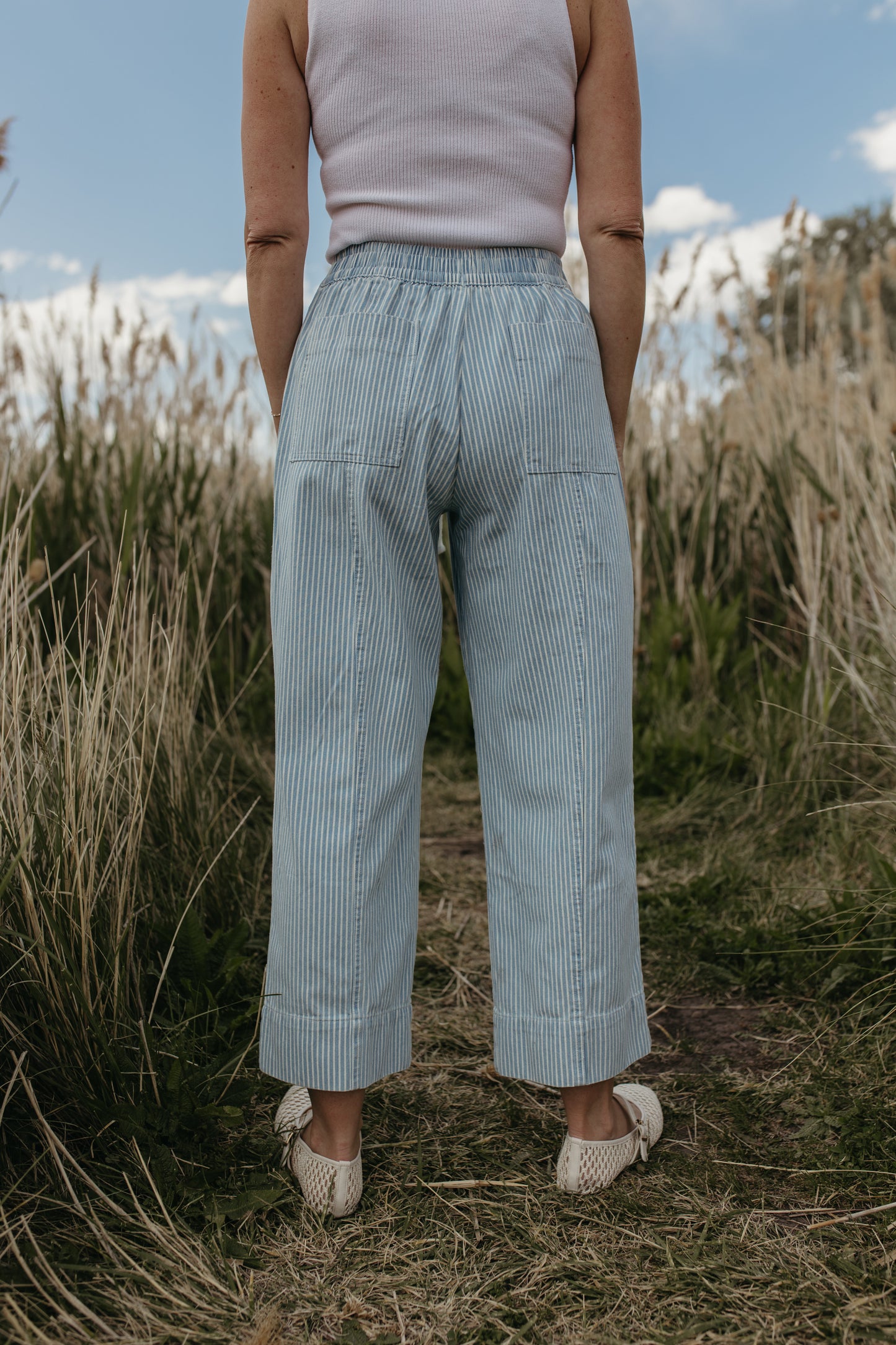 THE TATUM STRIPED CROPPED WIDE LEG PANTS IN LIGHT BLUE