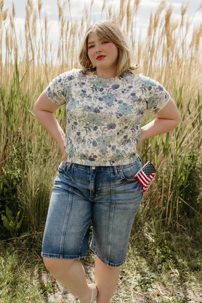 THE OLIVE SLOUCHY BERMUDA SHORTS IN MEDIUM WASH
