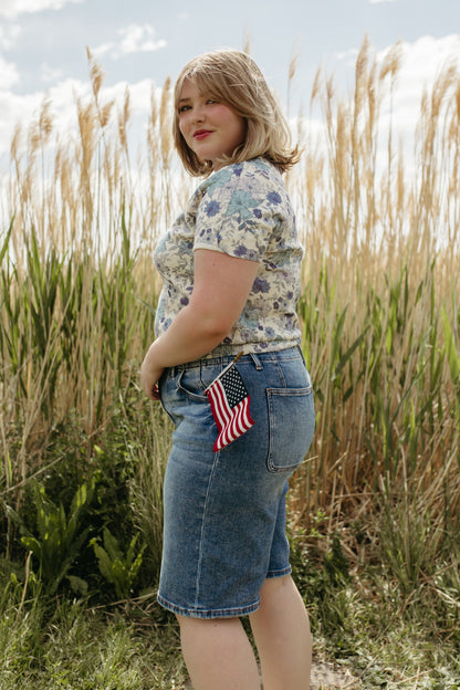 THE OLIVE SLOUCHY BERMUDA SHORTS IN MEDIUM WASH