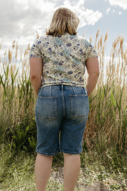 THE OLIVE SLOUCHY BERMUDA SHORTS IN MEDIUM WASH
