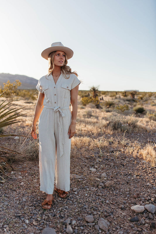 THE KARINA BUTTON DOWN BELTED JUMPSUIT IN NATURAL