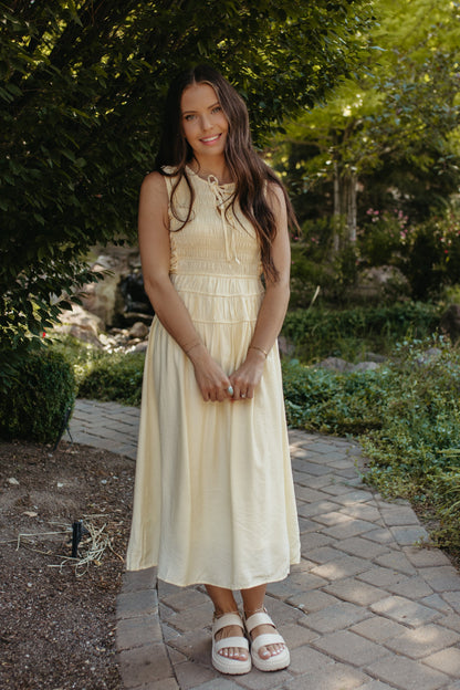 THE ROBIN FRONT TIE SMOCKED DRESS IN YELLOW