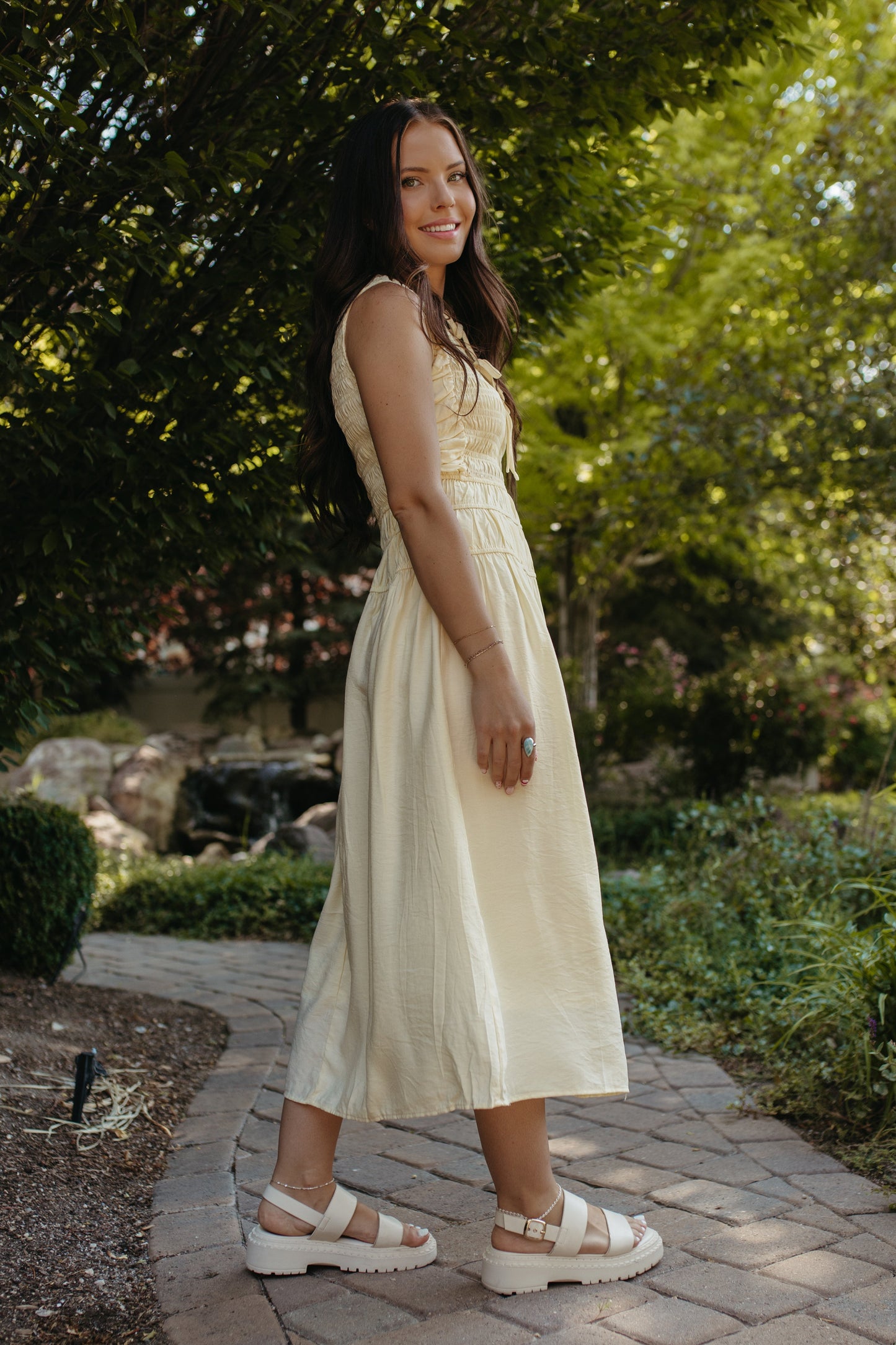 THE ROBIN FRONT TIE SMOCKED DRESS IN YELLOW