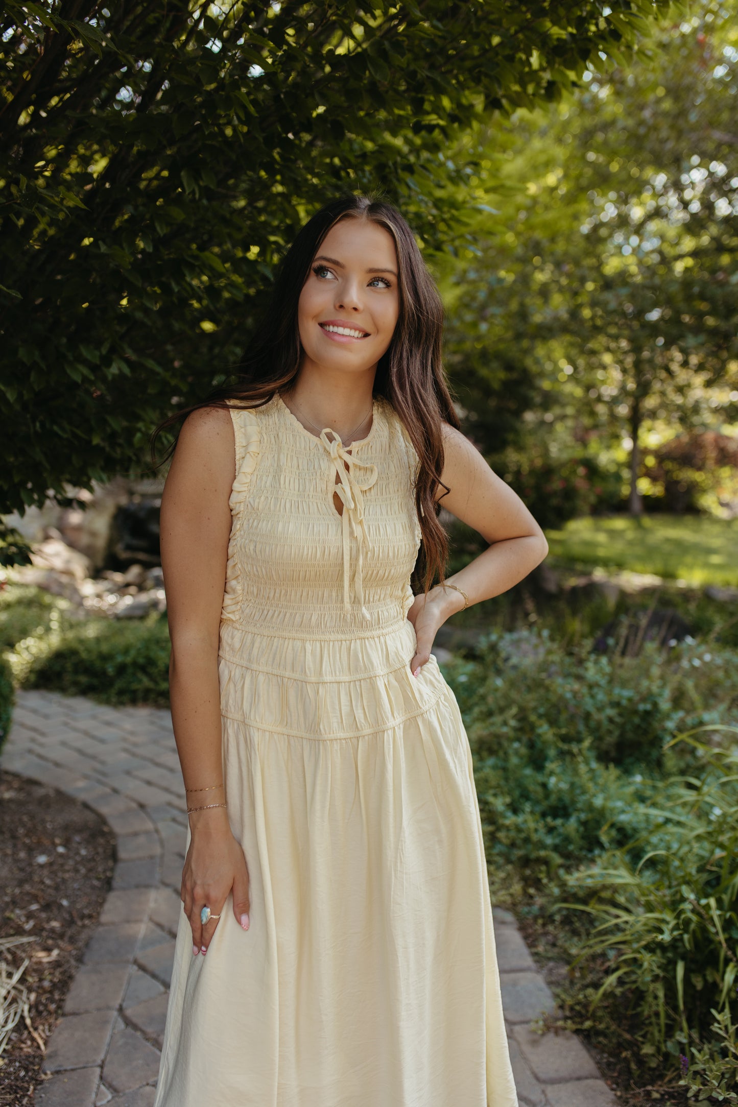THE ROBIN FRONT TIE SMOCKED DRESS IN YELLOW