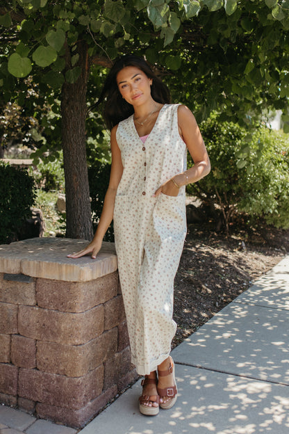 THE AYLA FLORAL V-NECK BUTTON JUMPSUIT IN CREAM