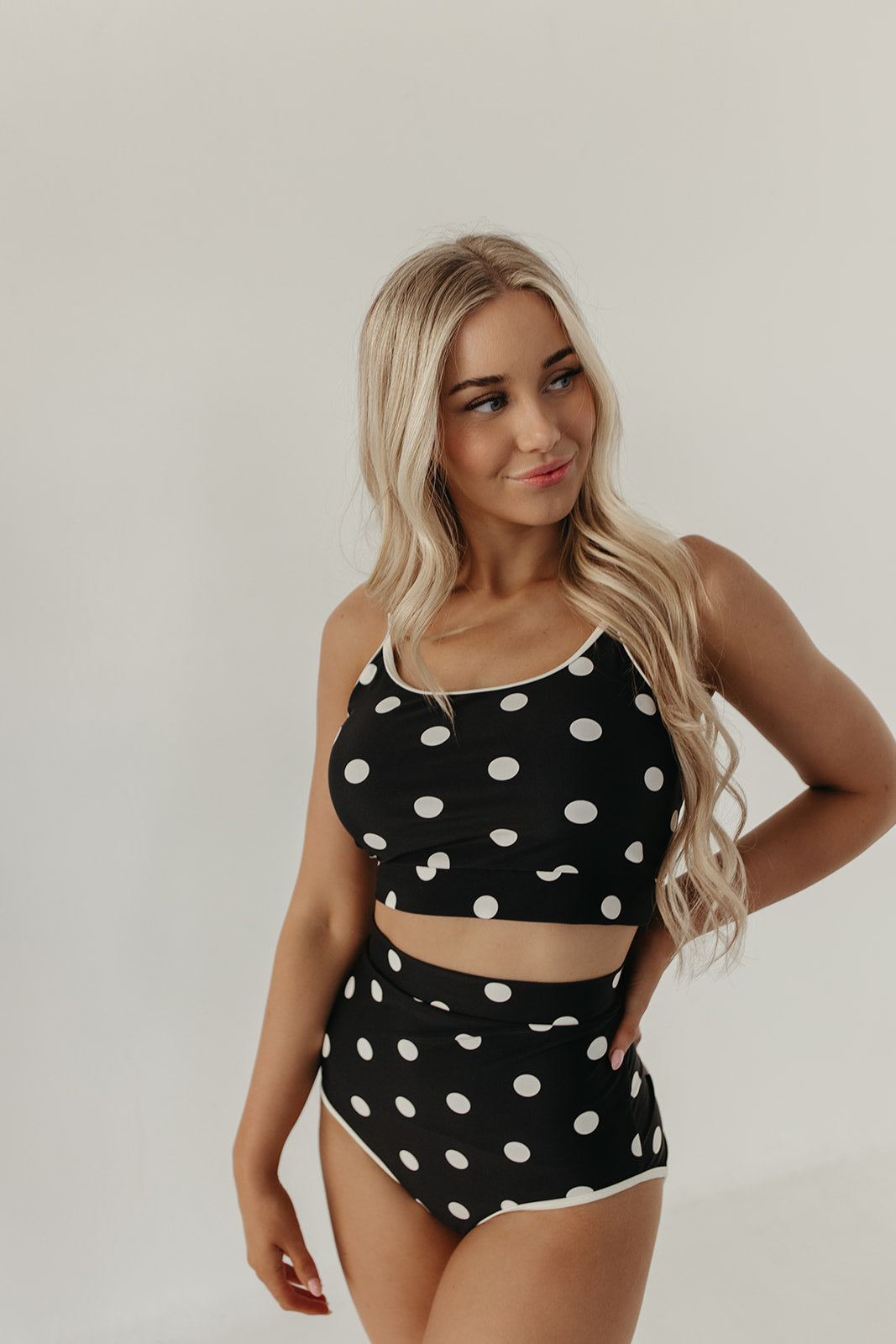 CONTRAST TRIM SWIM TOP IN DOTS BY PINK DESERT