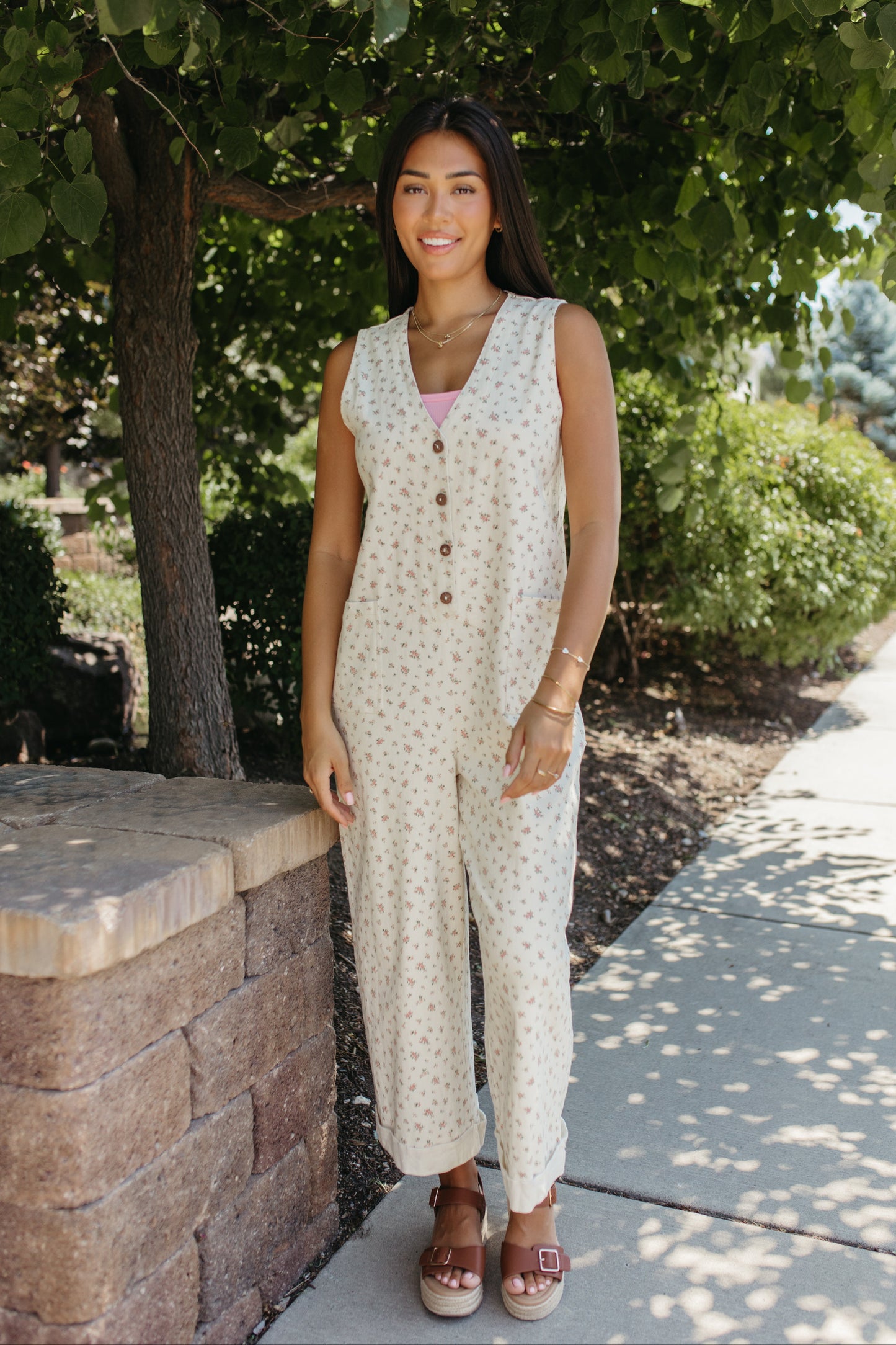 THE AYLA FLORAL V-NECK BUTTON JUMPSUIT IN CREAM