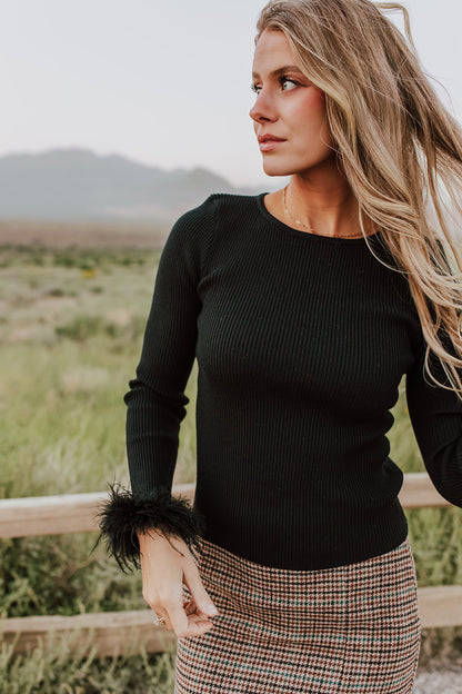 THE FEATHER CUFF LONG SLEEVE TOP IN BLACK