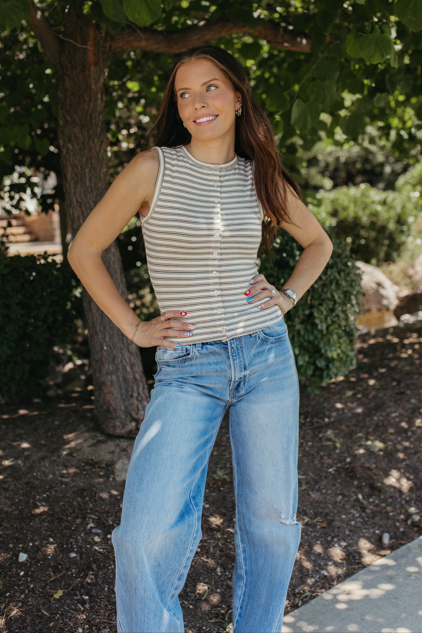 THE GUINEVERE STRIPED SLEEVELESS BUTTON TANK IN IVORY