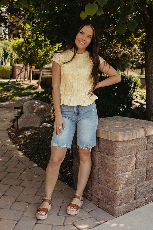 THE CLAUDIA RUCHED RUFFLED HEM TOP IN YELLOW