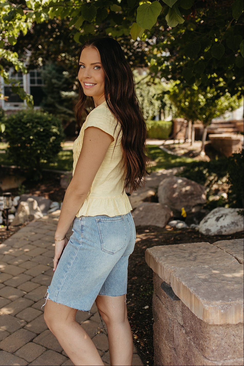 THE CLAUDIA RUCHED RUFFLED HEM TOP IN YELLOW
