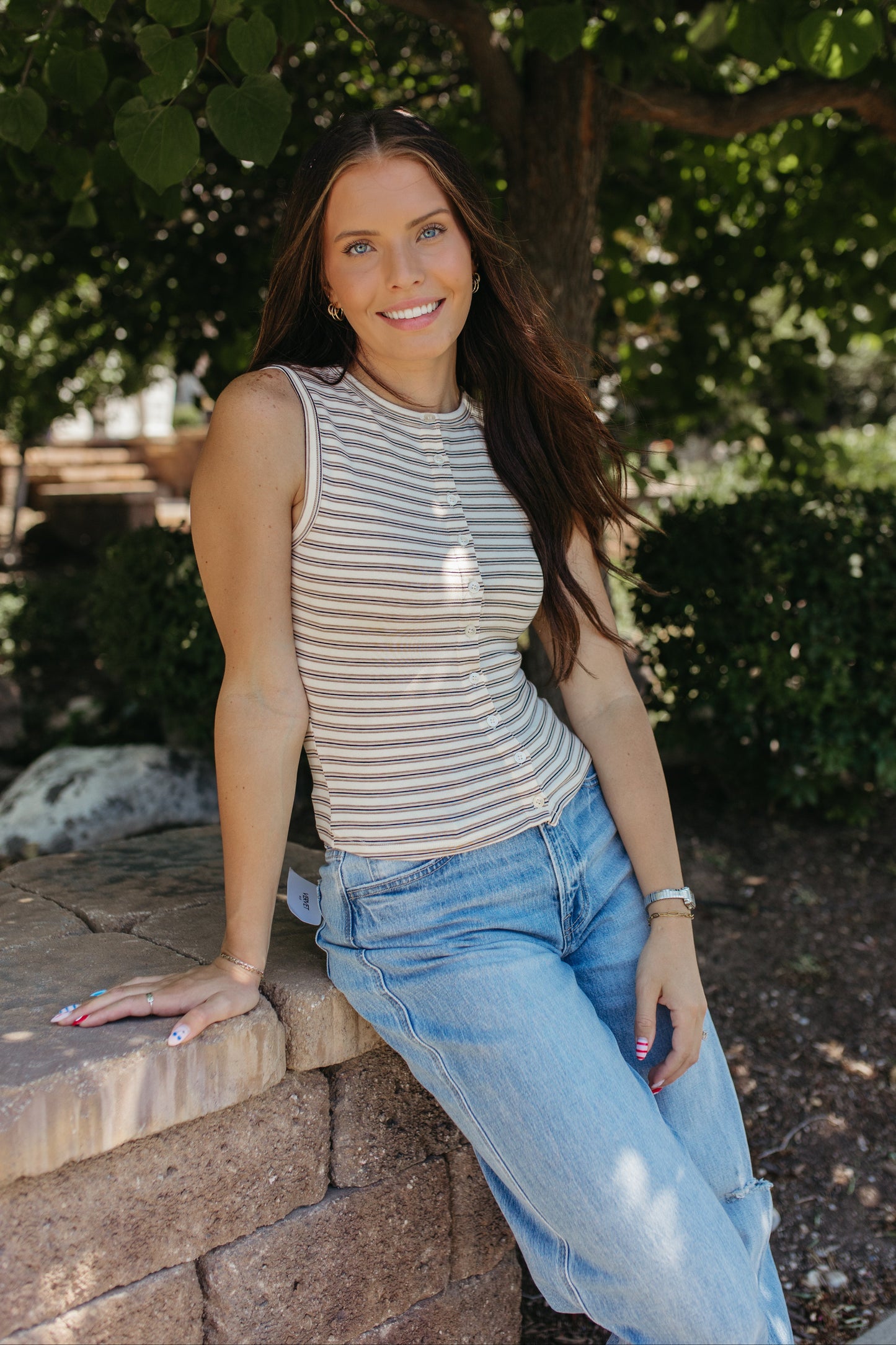 THE GUINEVERE STRIPED SLEEVELESS BUTTON TANK IN IVORY