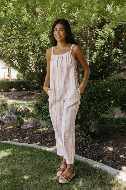 THE SERENITY STRIPE JUMPSUIT IN IVORY