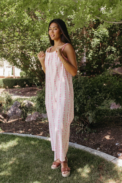THE SERENITY STRIPE JUMPSUIT IN IVORY