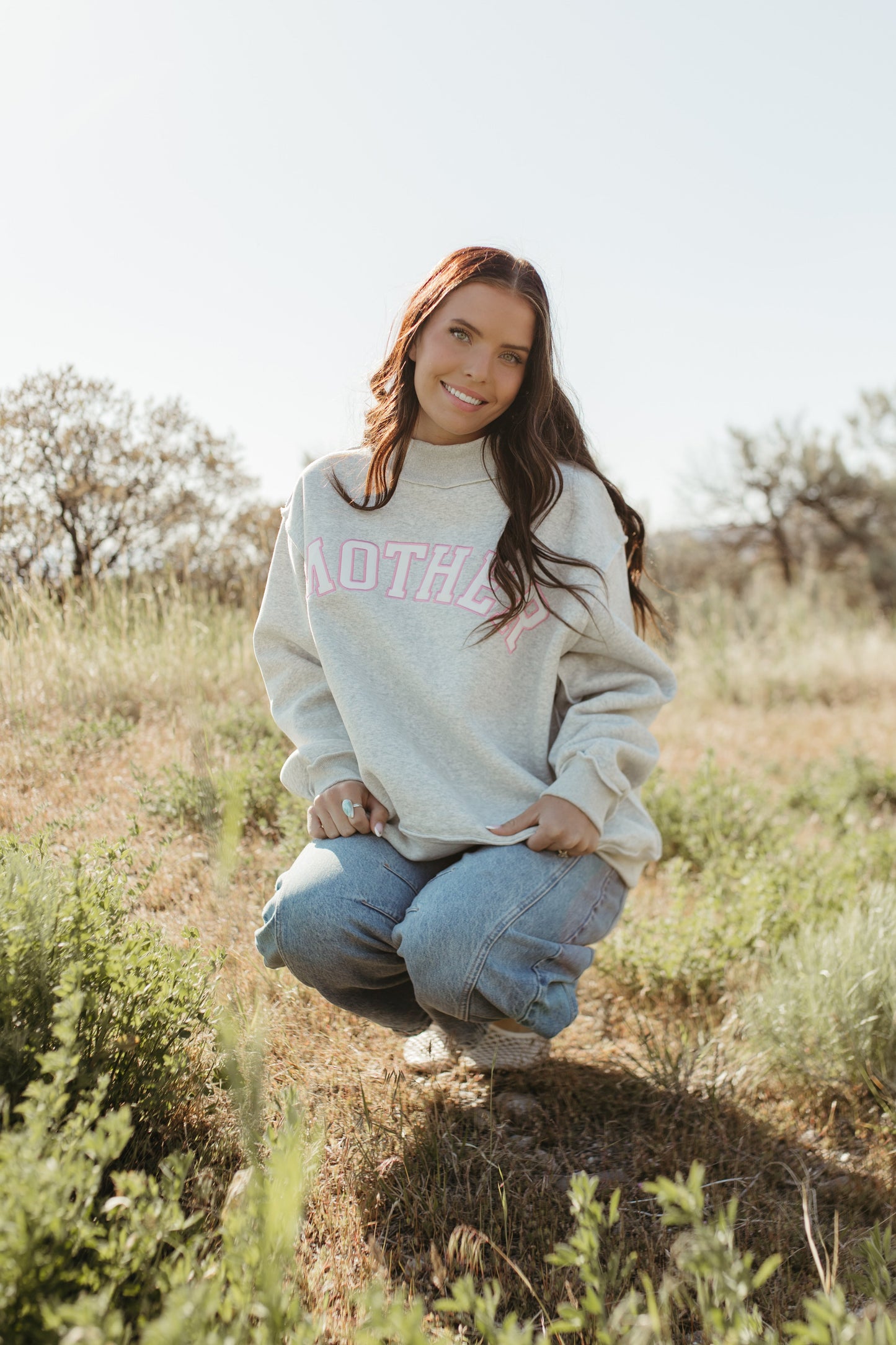 THE MOTHER MOCK NECK IN GREY AND PINK