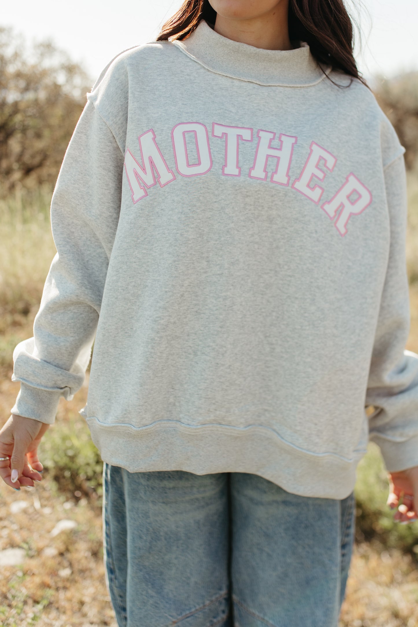 THE MOTHER MOCK NECK IN GREY AND PINK